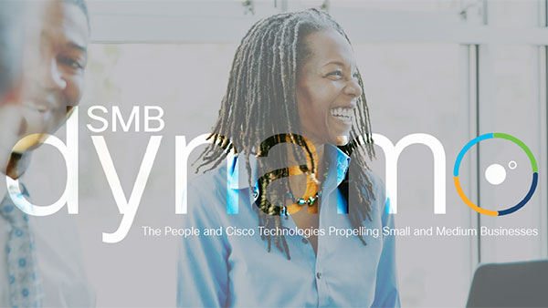Cover image of SMB dynamo Volume 2 e-book. An entrepreneur smiles during a meeting